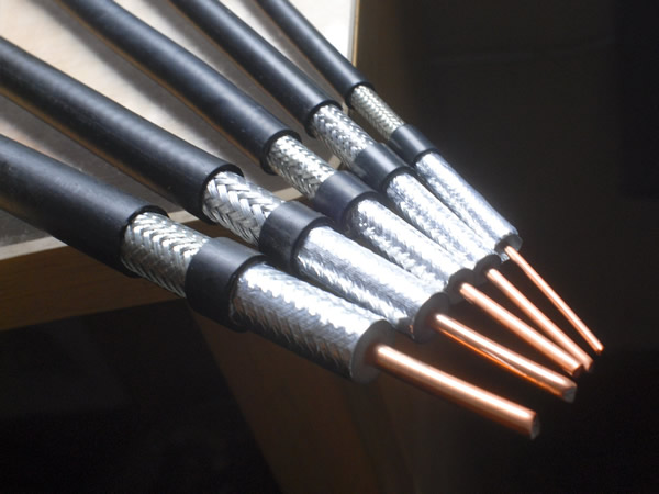 Coaxial cables are composed of copper conductors with insulation material isolation.
