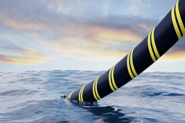 The process of laying submarine armored cables.